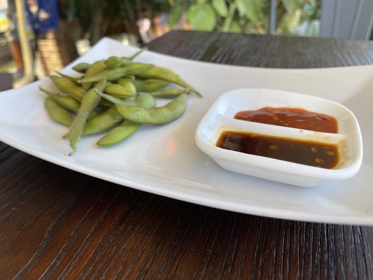 Edamame with hot sauce dips