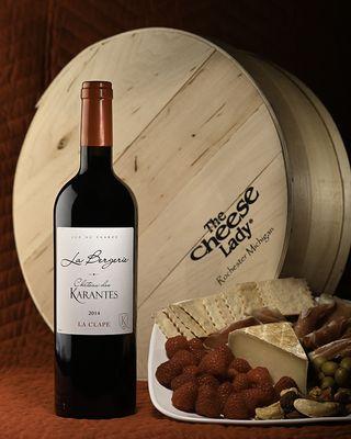 Château des Karantes Red Blend Grand Cru 2014 Languedoc. Luxurious blend of Syrah, Mourvèdre and Grenache. Cheese ? Ossau-Iraty. Cheers.