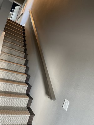 Stainless steel interior stairway handrails.