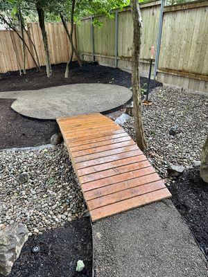 a round patio with bridge