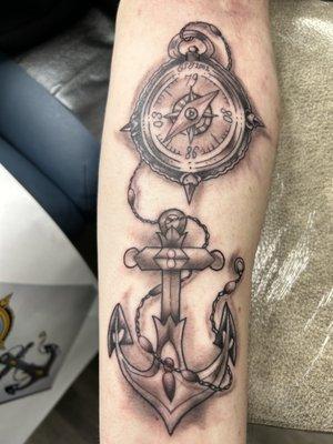 Black and grey anchor and compas tattoo