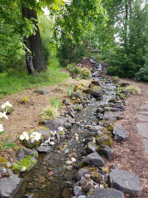 This creek bed water feature had numerous leaks; it now works excellently after we repaired it.