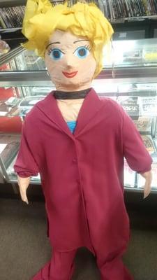 The Hillary: Cinderella piñata, thrift store pant suit, blue hair ribbon removed.