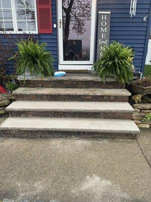 Our front porch they are coming back to install railing