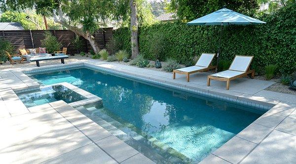 Pool design, sand finish concrete pool deck and drought tolerant plantings.