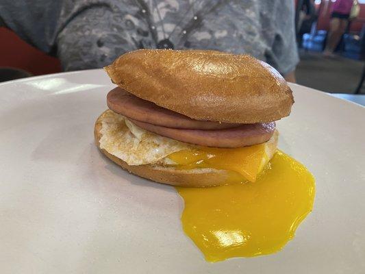 A Pork Roll, egg, and cheese breakfast on a bagel.