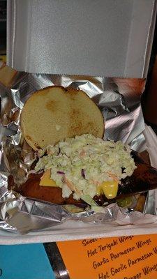 Jumbo hot Frank with coleslaw and cheese a little something to heat up your day