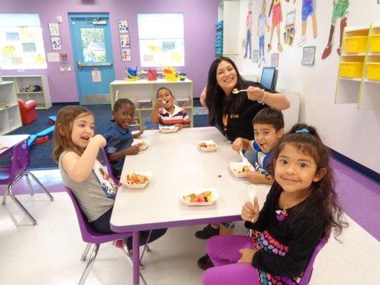 Our VPK class enjoying their fruit salad that they made.