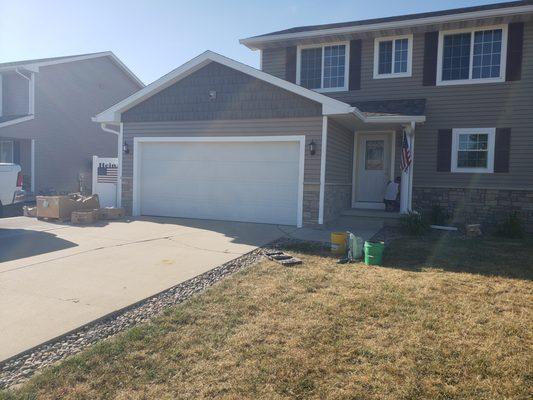 New vinyl siding and stone veneer in Pleasant Hill