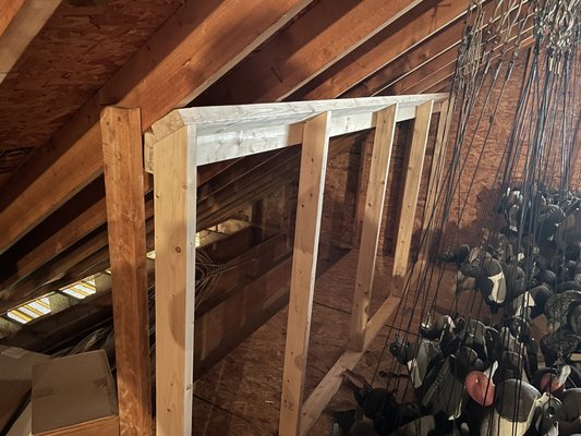 Rafter support in attic