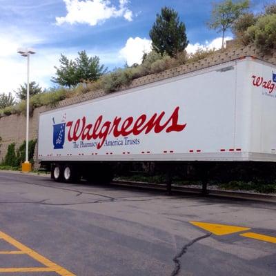 A Walgreens trailer parked in front of the store.