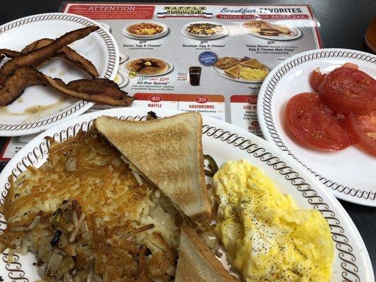 Breakfast plate with a side of tomatoes