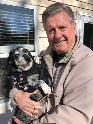 Daniel loves his incredible, lovable dachshund, Greyson, gets set for Church..thanks God