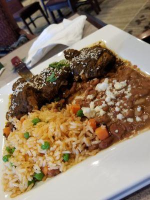 Mole: rice and beans are good. There should be more sauce, like authentic mole has. This was more of a rub. Chicken was dry and cold.