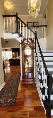 Transformed from carpeted steps and stained railing into this stunning stairway