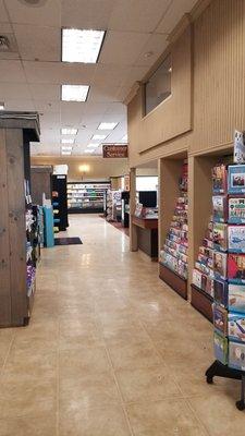 Customer service, checkout at the far end by frozen foods