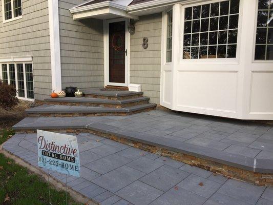 Distinctive Total Home, blue stone pavers, porch.