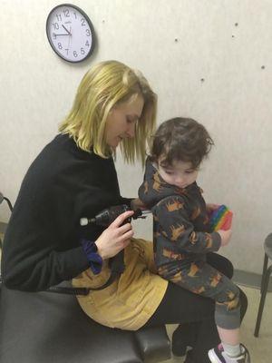 Dr. Super doing a Pediatric adjustment