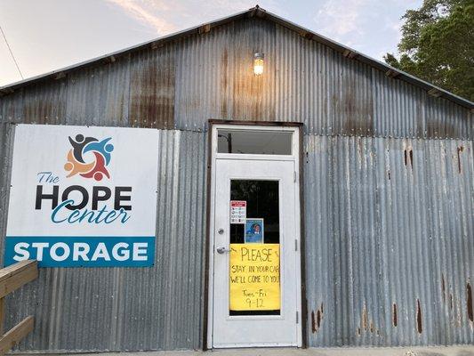 Come behind the Loft and pull up to our Food Pantry "barn"for food each month.