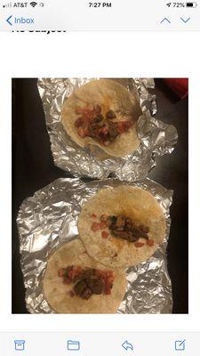 Tonight's tacos - there was a total of 1.5 ounces of beef. Cheese and fajita veggies were left off.