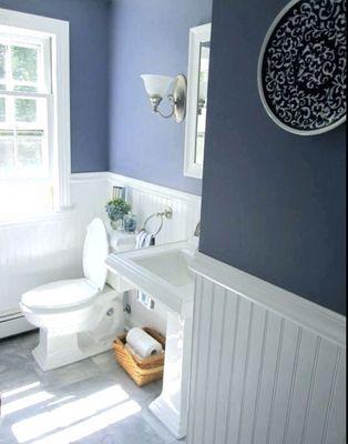 Small half Bath Remodeling project. New floor tile installation, paint, and white bead-board wainscoting.