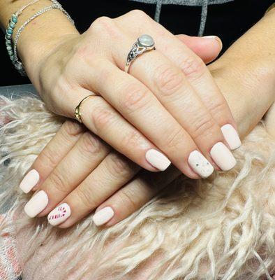 Gel mani with candy canes and snow flake!