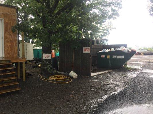 Dumpster hidden behind next lot