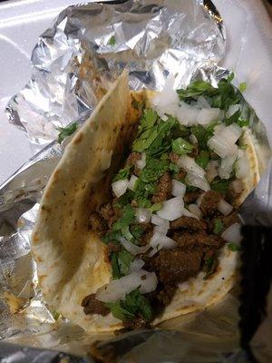 Carne asada tacos with onion and cilantro on flour tortilla 1.99 each and so many other meats to choose