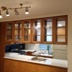 Kitchen cabinets redone. Sanded down, stained and polyurethaned for a nice glossy shine and new look.