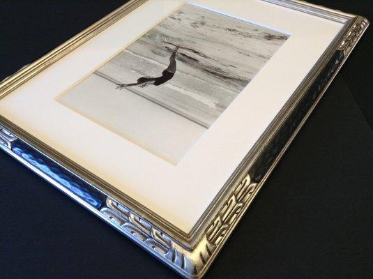 Arts and Crafts frame gilded with white gold over black clay, UV museum glass and archival mat. Photograph by Jesse A. Fernandez, 1925-1986.