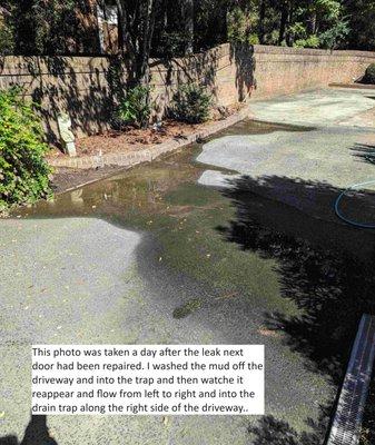 Flooding in my driveway caused by W. Johnson's damaging neighbors' irrigation line.