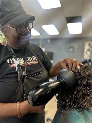 Regina doing a Purple/Orange rod perm