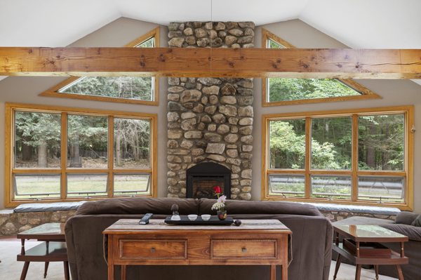 Breathtaking fireplace in the grand living room of a home we sold in Standish.