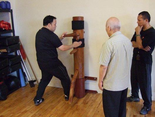 Breaking the Jong down, With Yip Man's student Moy Bing Wah, family.