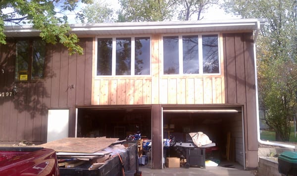 Cedar siding replacement and new alside Ultramax windows in Fridley, MN