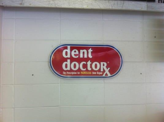 Look for this sign. Dent Doctor. Great service, reasonable price. No gouging girls. Haha!