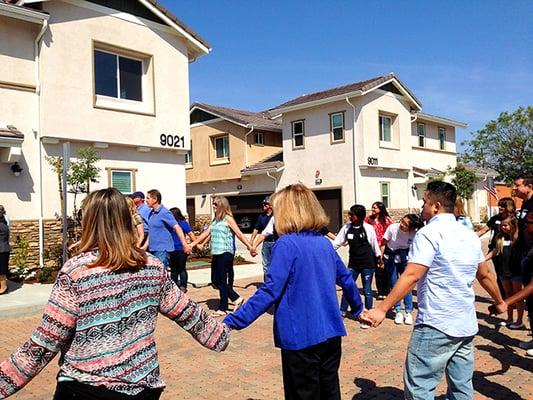 Habitat for Humanity dedication after construction cleanup