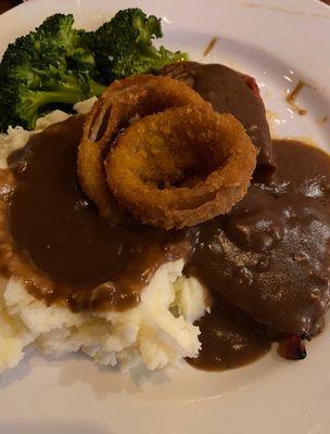 Meatloaf with mashed potatoes.