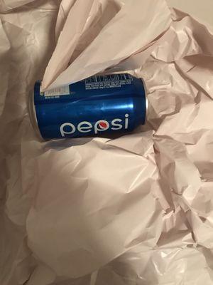 Full large box marked "kitchen" found full of paper and an empty Pepsi can.