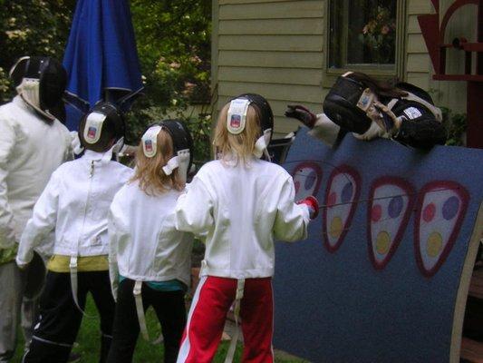 Youth fencing summer camp session/s, target practice.