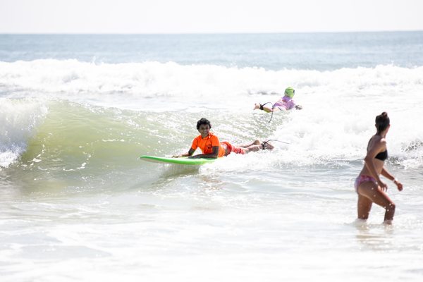 The Sandy Avocado Surf Camp offers surfing, ski boarding, yoga, and art!