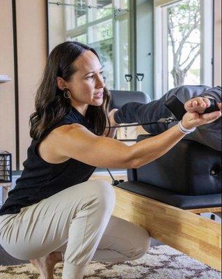 Janet providing Pilates instruction