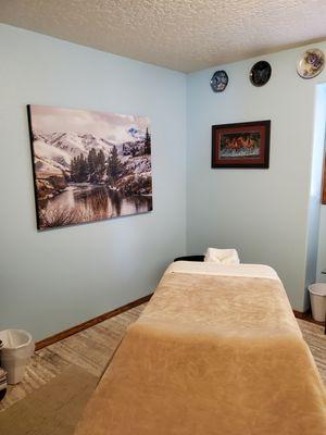 Inviting decor in the massage room.