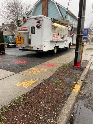 The truck outside of 181 W Old Country Rd in Hicksville