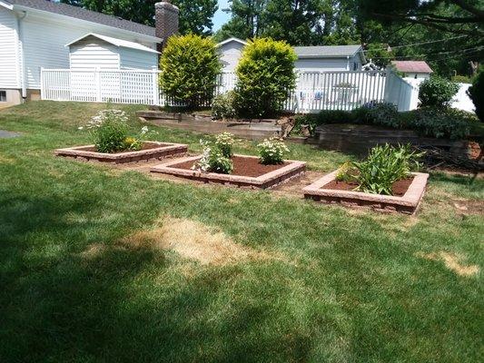 Removal of old railroad ties and installation of Windsor wall stones