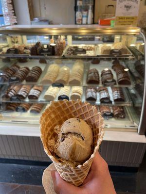 Single scoop of Rush Hour ice cream in a waffle cone