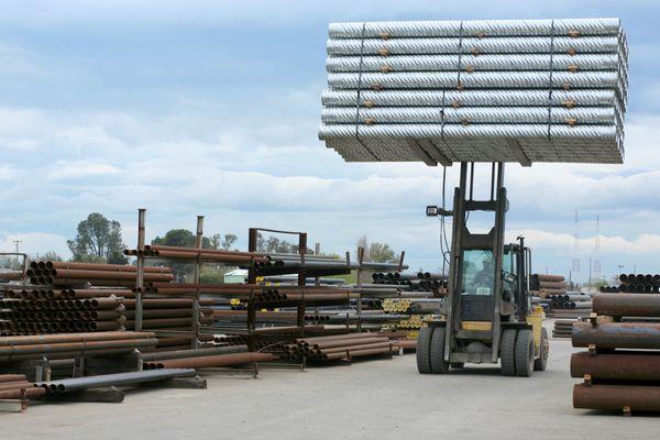 Corrugated Metal Pipe being transported on forklift