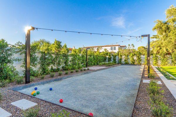 This bocce ball court made for a fun addition to an entertaining backyard landscape design