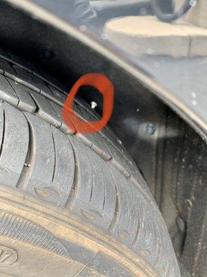 The nail that found its way lodged into my rear passenger side tire.