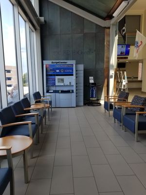 Lobby waiting area includes an Express Prescription pickup kiosk